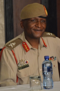 Lesotho's "renegade" Lt. Gen. Tlali Kamoli, smiling after signing the Oct. 23 peace deal, is now accused of breaching it. (Photo: mjj)